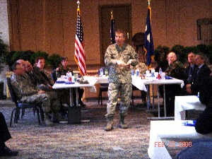 Lt. Gen. Charles E. Croom Jr., USAF, director, Defense Information Systems Agency and commander, Joint Task Force-Global Network Operations, addresses the February luncheon about technology challenges facing the military forces.